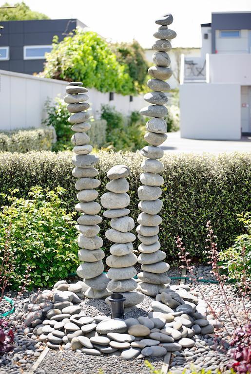 Bellano Motel Suites Christchurch Exteriör bild A stone cairn